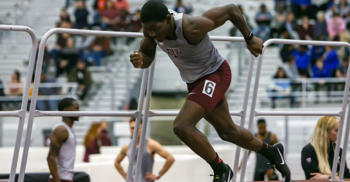 Texas A&M runner goes full-on Superman to dive over the line and win race