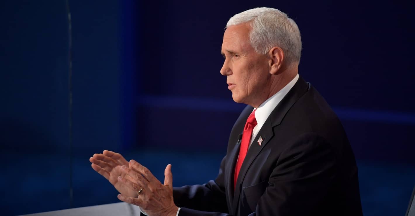 Joe Biden poses with swatter after fly lands on Mike Pence's head