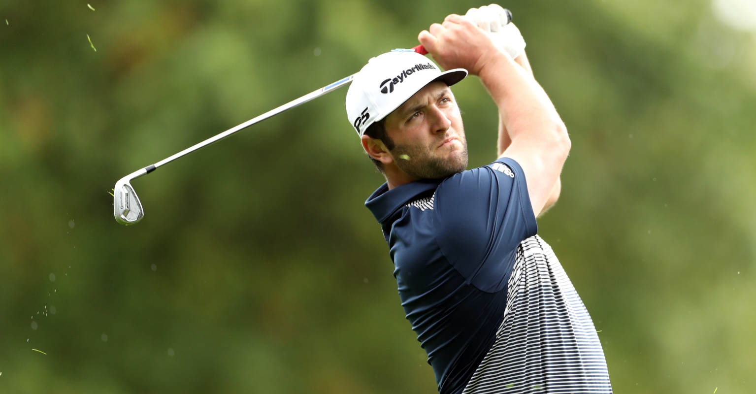 Golfer scores incredible hole-in-one by skimming ball over a pond at the Masters