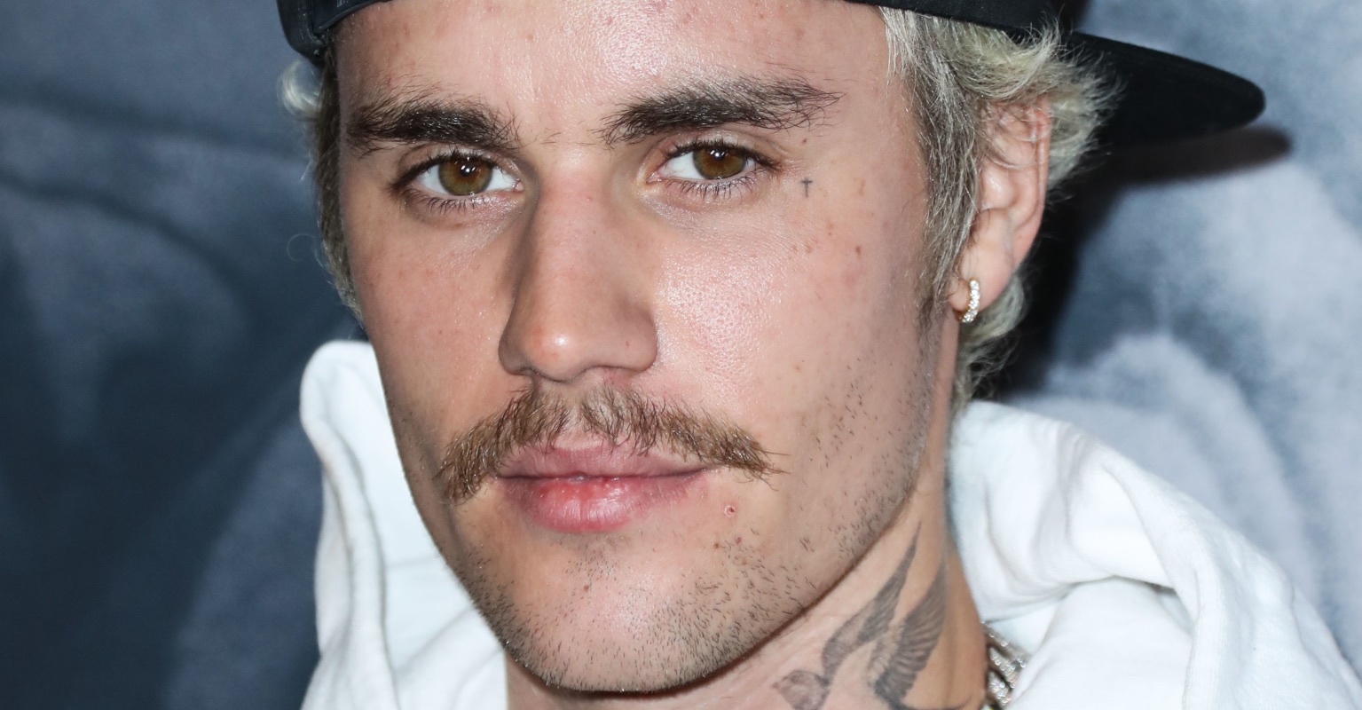 Justin Bieber pleads with fans to stop gathering outside his home