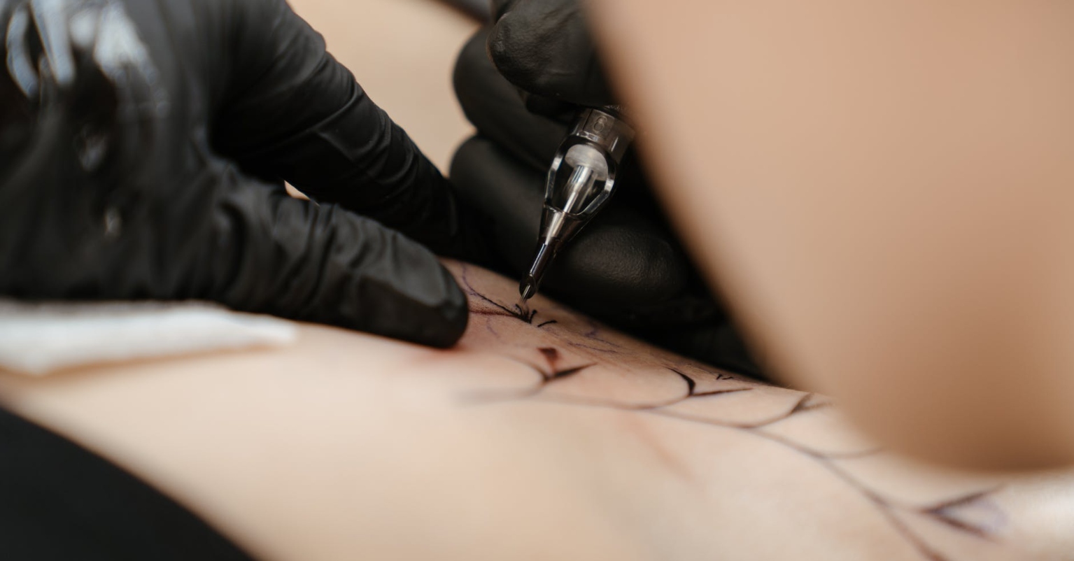 Dad spends 30 hours getting tattoo to match 8-year-old son's birthmark