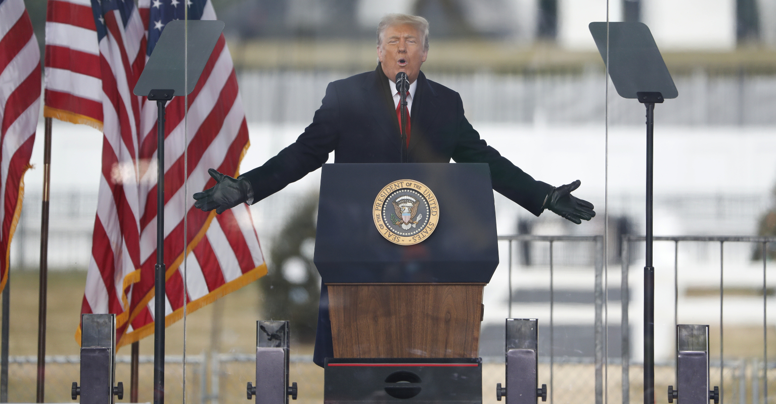 Lawyer for Trump supporter photographed carrying lectern tells reporters 'I'm not a magician'