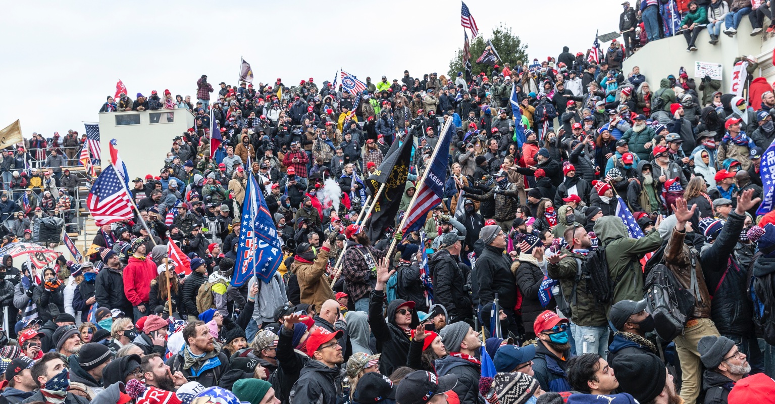 Judge orders 'entitled' man photographed with foot on Nancy Pelosi's desk to be kept in jail