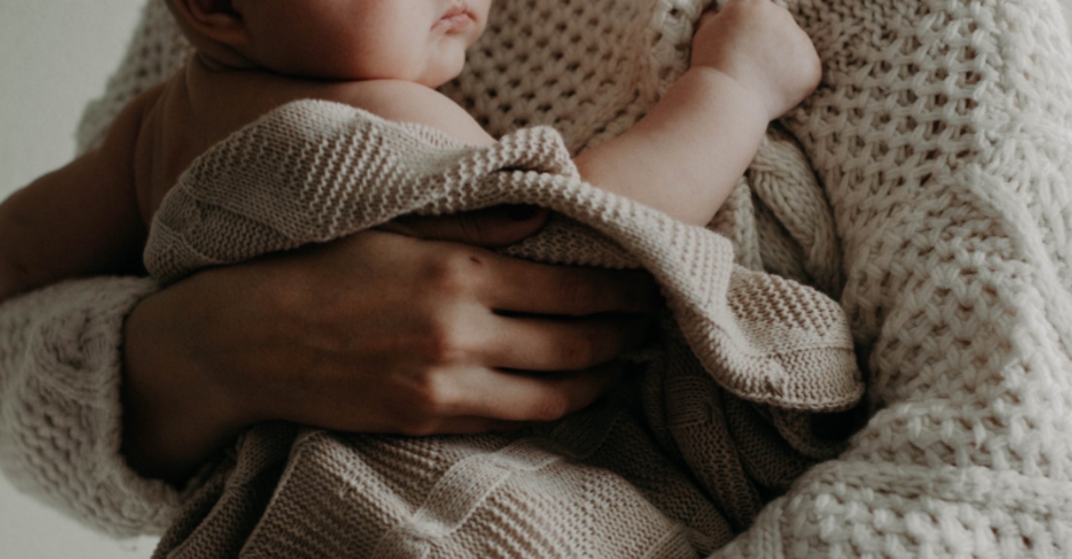 Influencer who married her stepson shares moving moment he meets their newborn baby