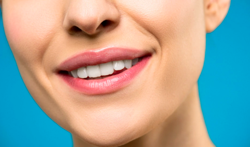 Woman who had all her teeth pulled out cries with joy after receiving new smile