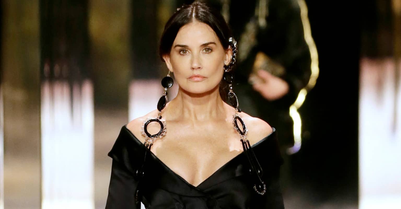 Demi Moore is age-defying as she models swimwear alongside her three lookalike daughters