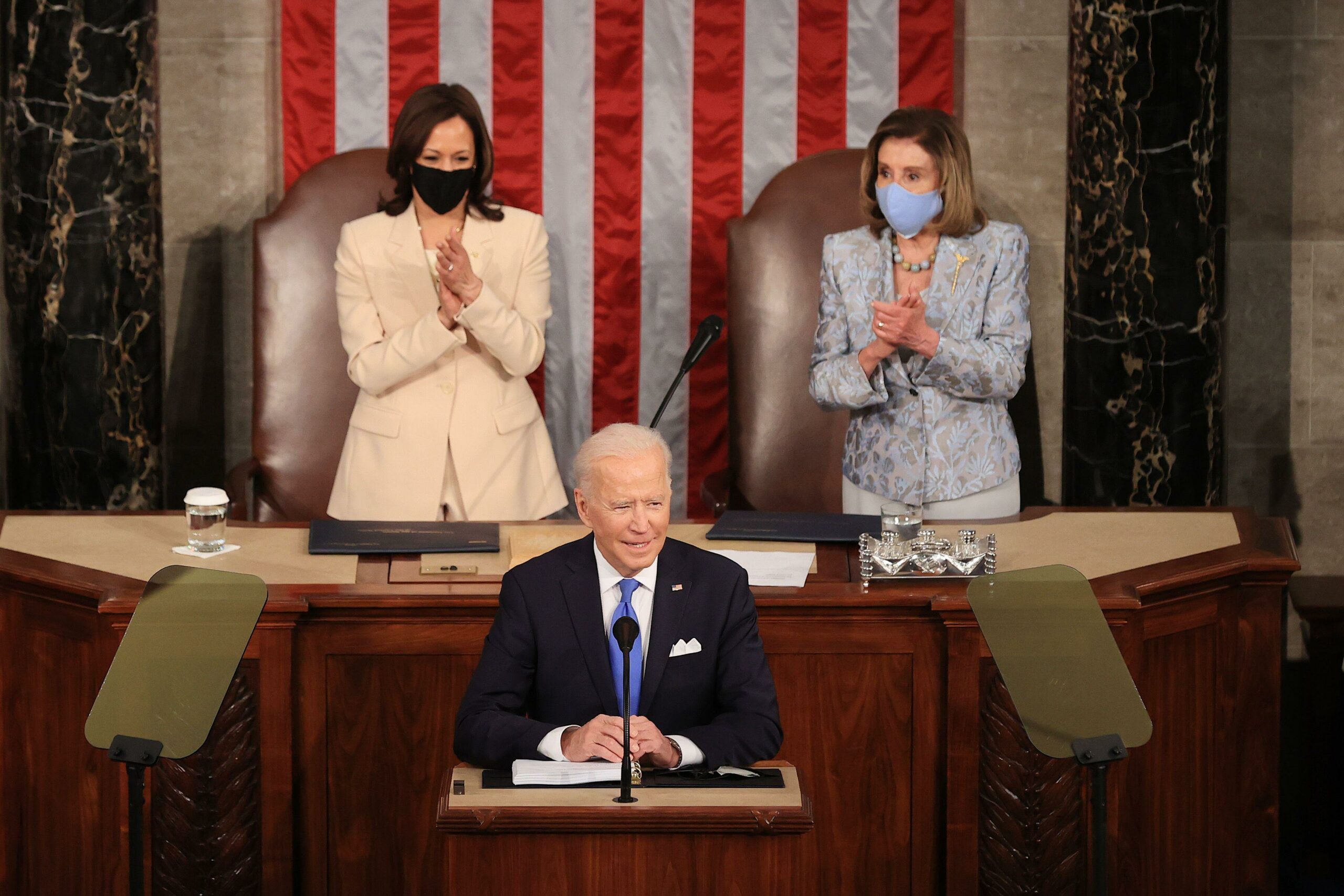 Kamala Harris and Nancy Pelosi make history as first two women to sit behind president during Congress speech