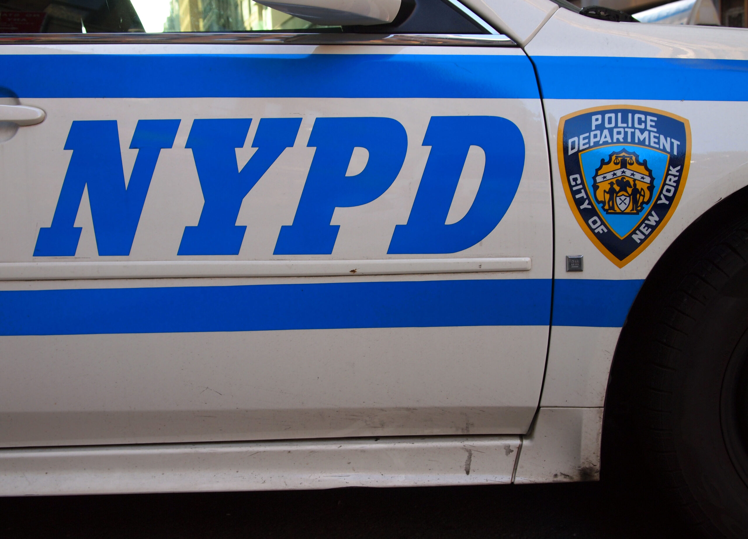 'Hero' NYPD officer seen running with wounded child following Times Square shooting