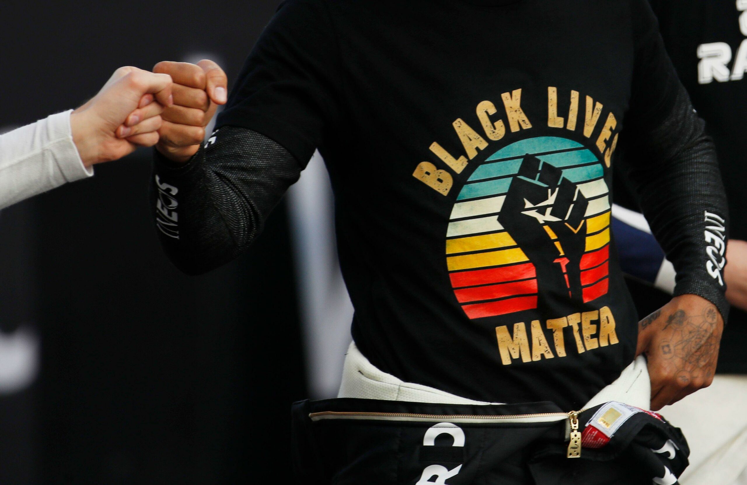 School sparks outrage as boy, 8, is ordered to turn his Black Lives Matter shirt inside out