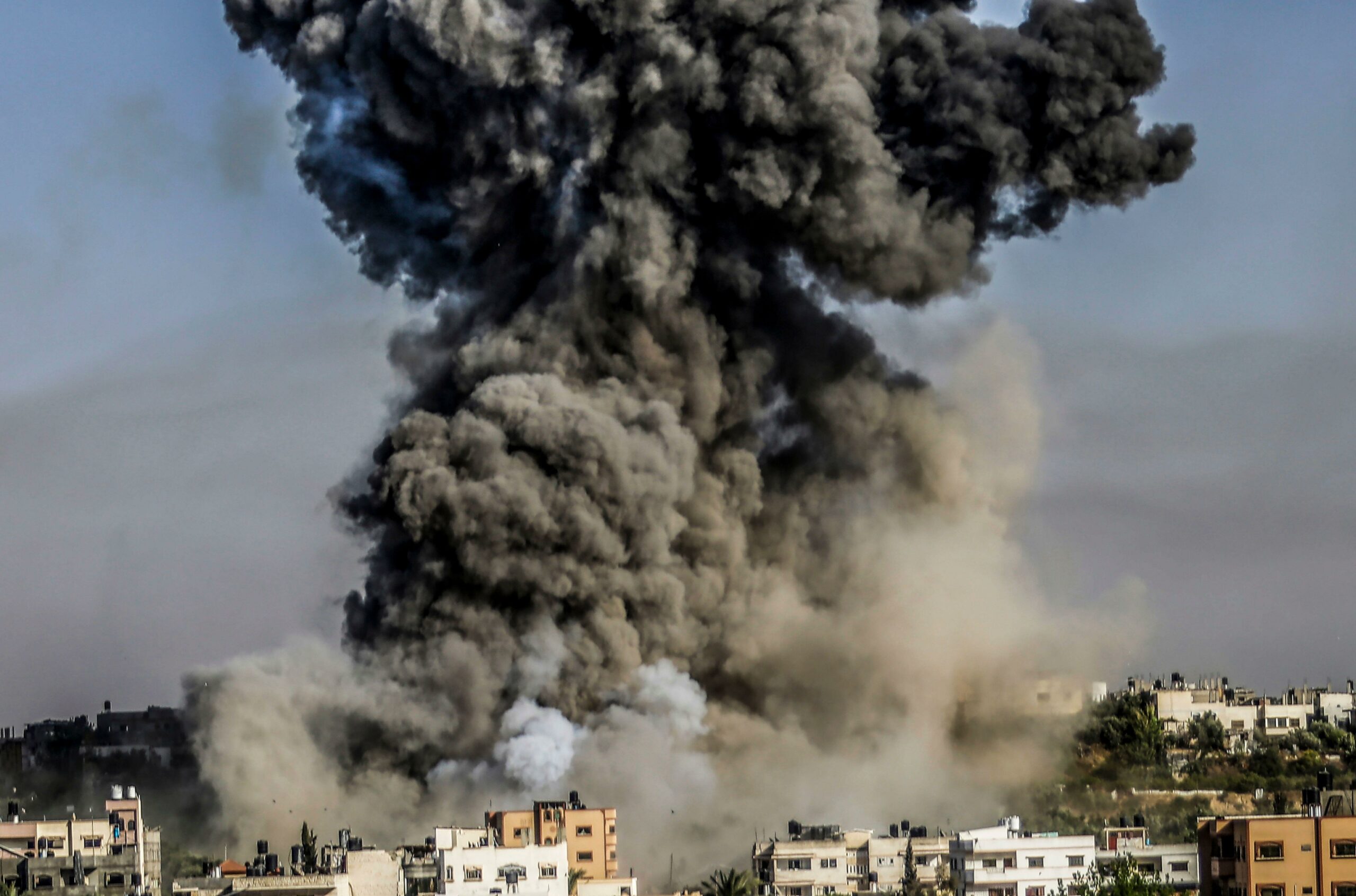 Largest 13-storey building in Gaza collapses after Israeli air strike as death toll soars to 35