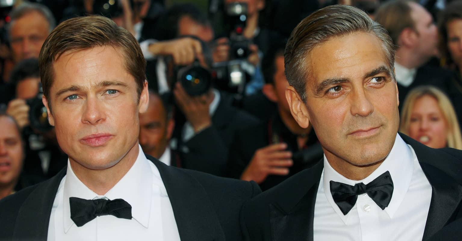 George Clooney clutches Brad Pitt pillow as he pretends to be obsessed fan in hilarious video