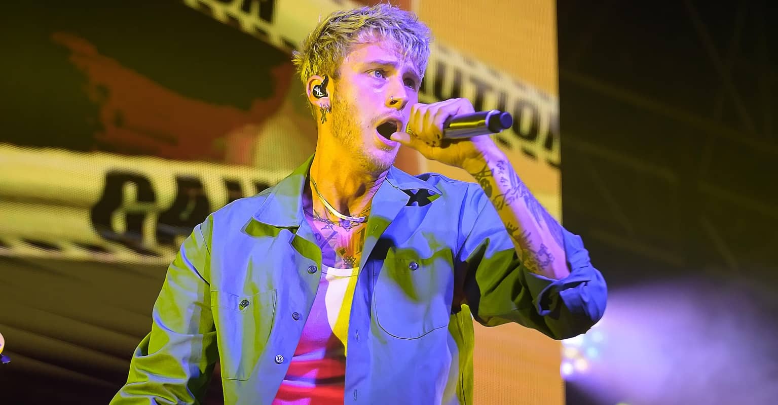 Machine Gun Kelly gets bottles thrown at him as he's booed off stage at Aftershock festival