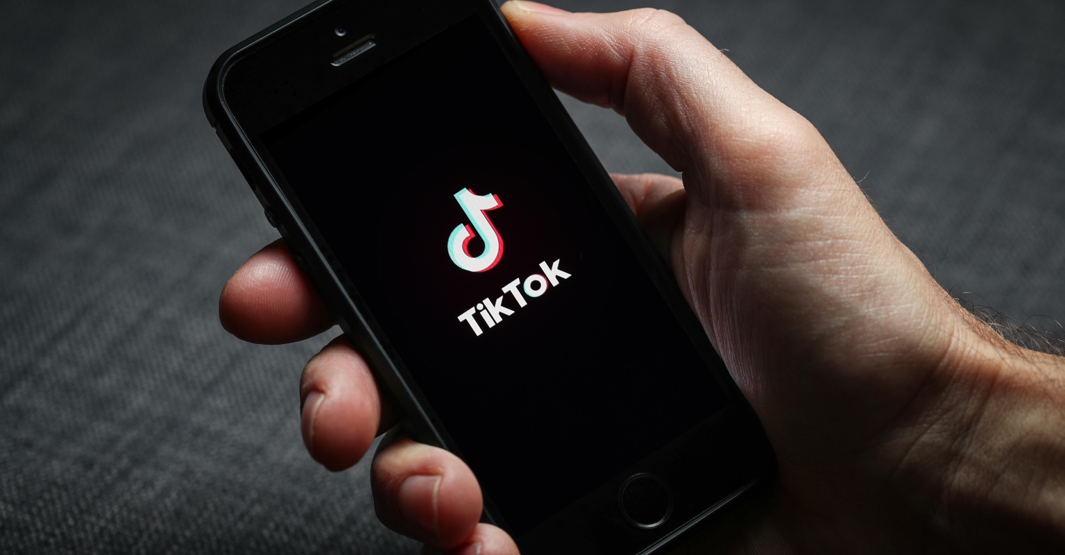 Woman bravely confronts men for taking secret pics of her - but TikTok removes her videos for ‘bullying’
