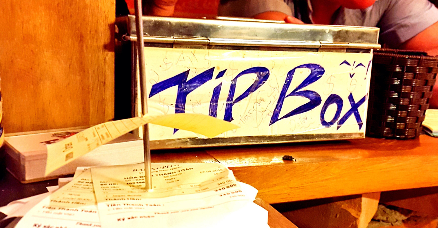 Restaurant hit with one-star reviews after owner splits bartender's $16,000 tip with staff