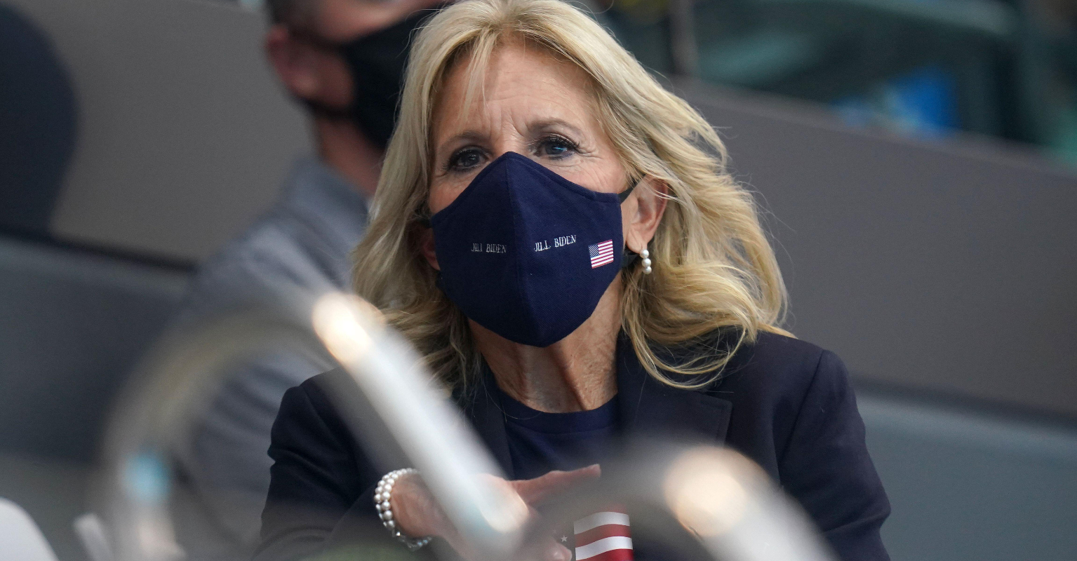 First Lady Jill Biden is cheered by Team USA swimmers at Tokyo Olympics