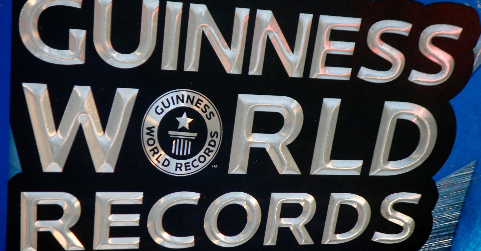 Woman, 31, sets Guinness World Record for 'biggest mouth' as she's able to fit an entire burger