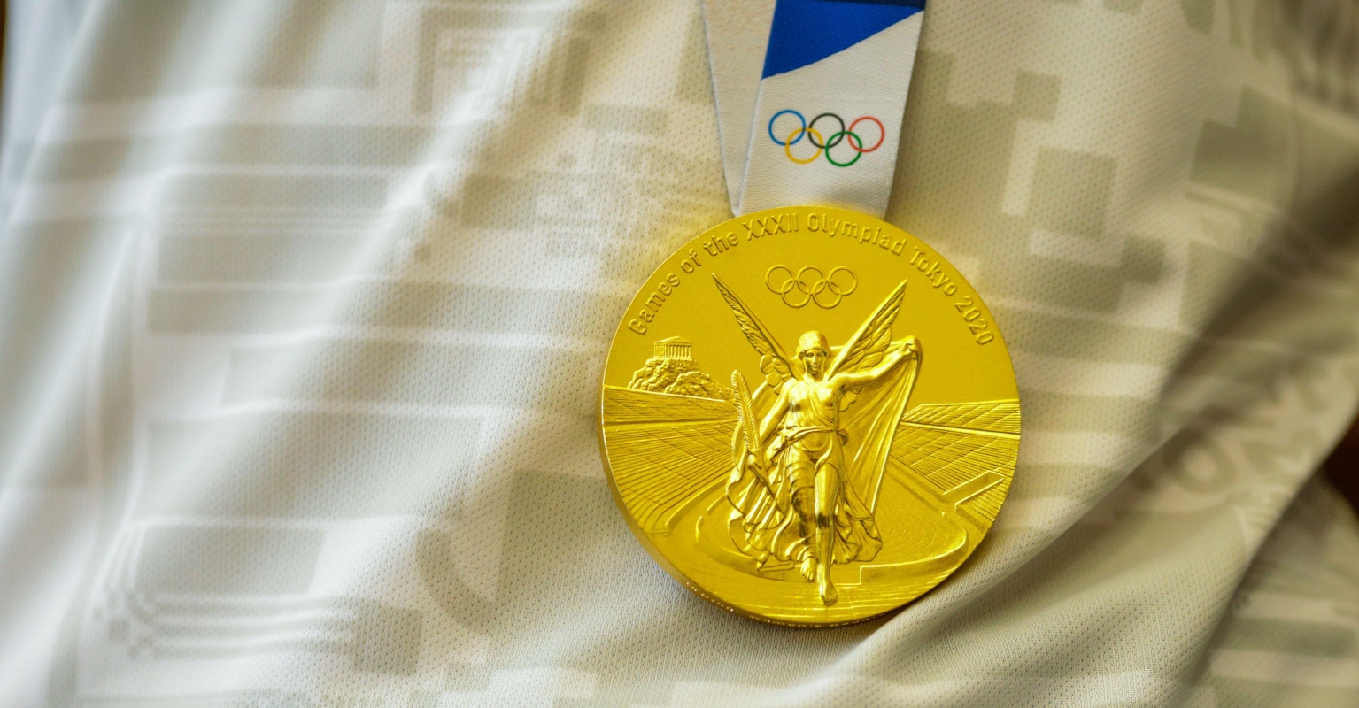 Japanese mayor who bit an Olympian's gold medal has reportedly offered to forfeit $13,000 of pay as punishment