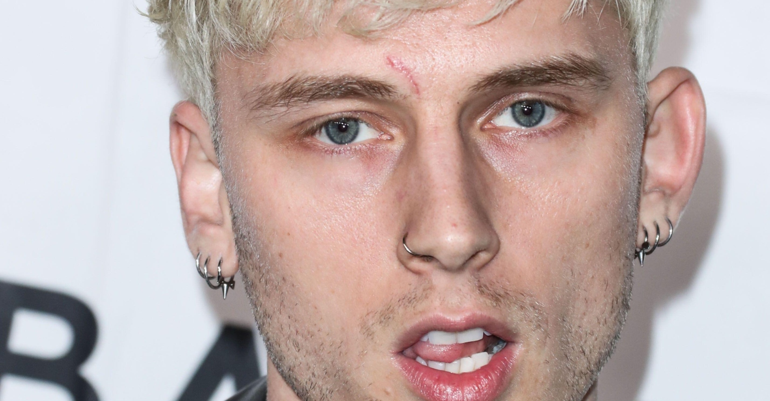 Machine Gun Kelly punches fan in audience at Louder Than Life festival after getting booed