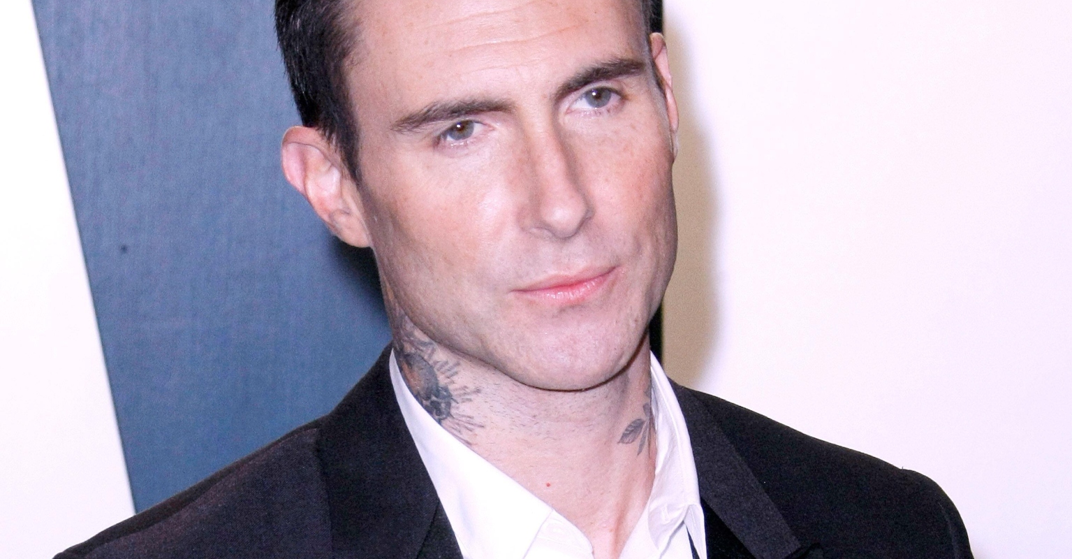 Adam Levine's response to fan rushing him on stage divides social media