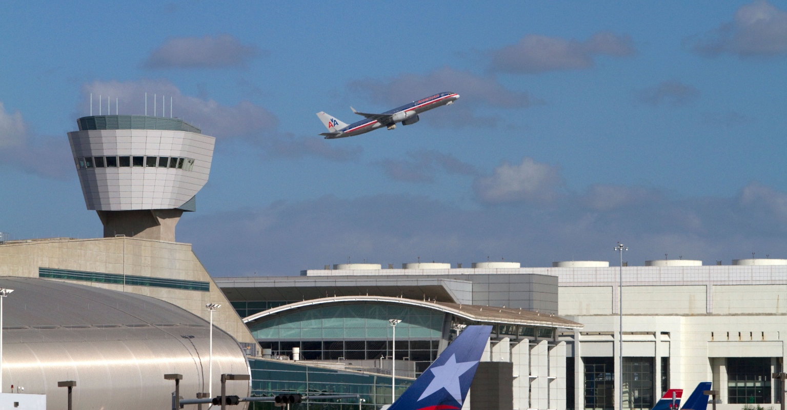 American Airlines passenger opens emergency exit and jumps onto wing of plane in Miami