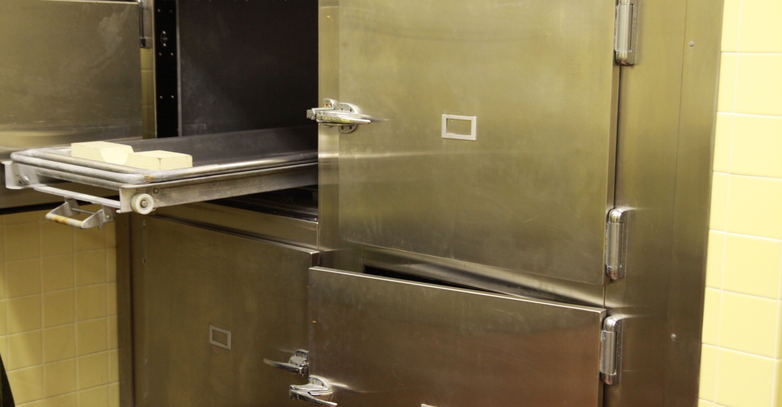 A man was found alive after being declared dead and left in a morgue freezer overnight