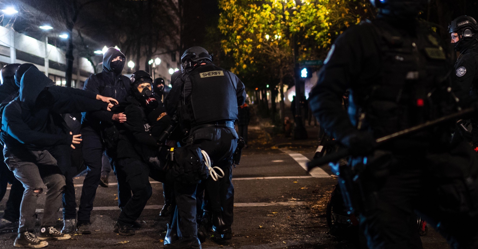 'Riot' declared in Portland as protesters and police clash after Kyle Rittenhouse's homicide acquittal