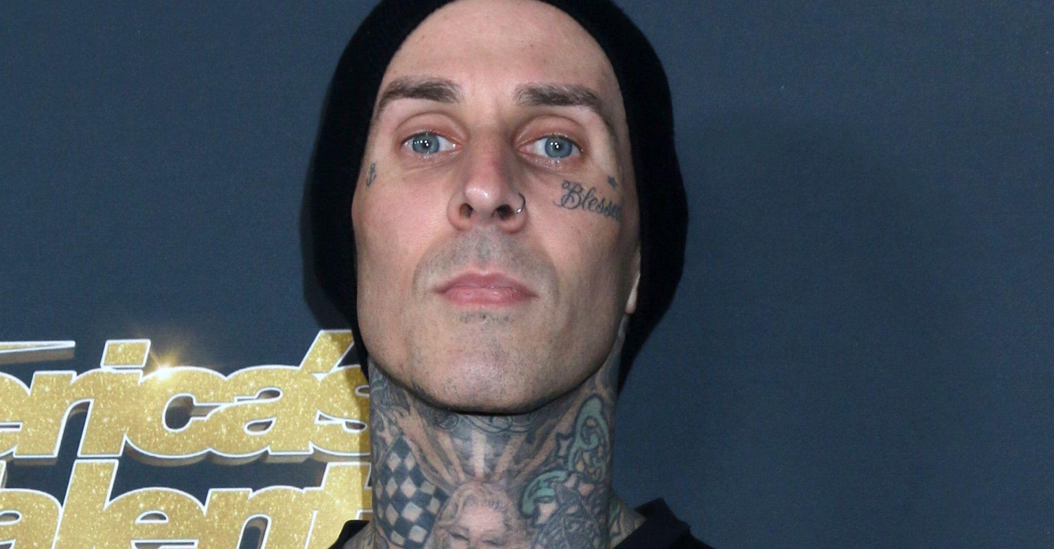 Travis Barker is unrecognizable without his face tattoos in Machine Gun Kelly's new music video