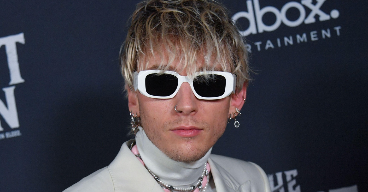 Machine Gun Kelly changes album title after getting it tattooed on Travis Barker