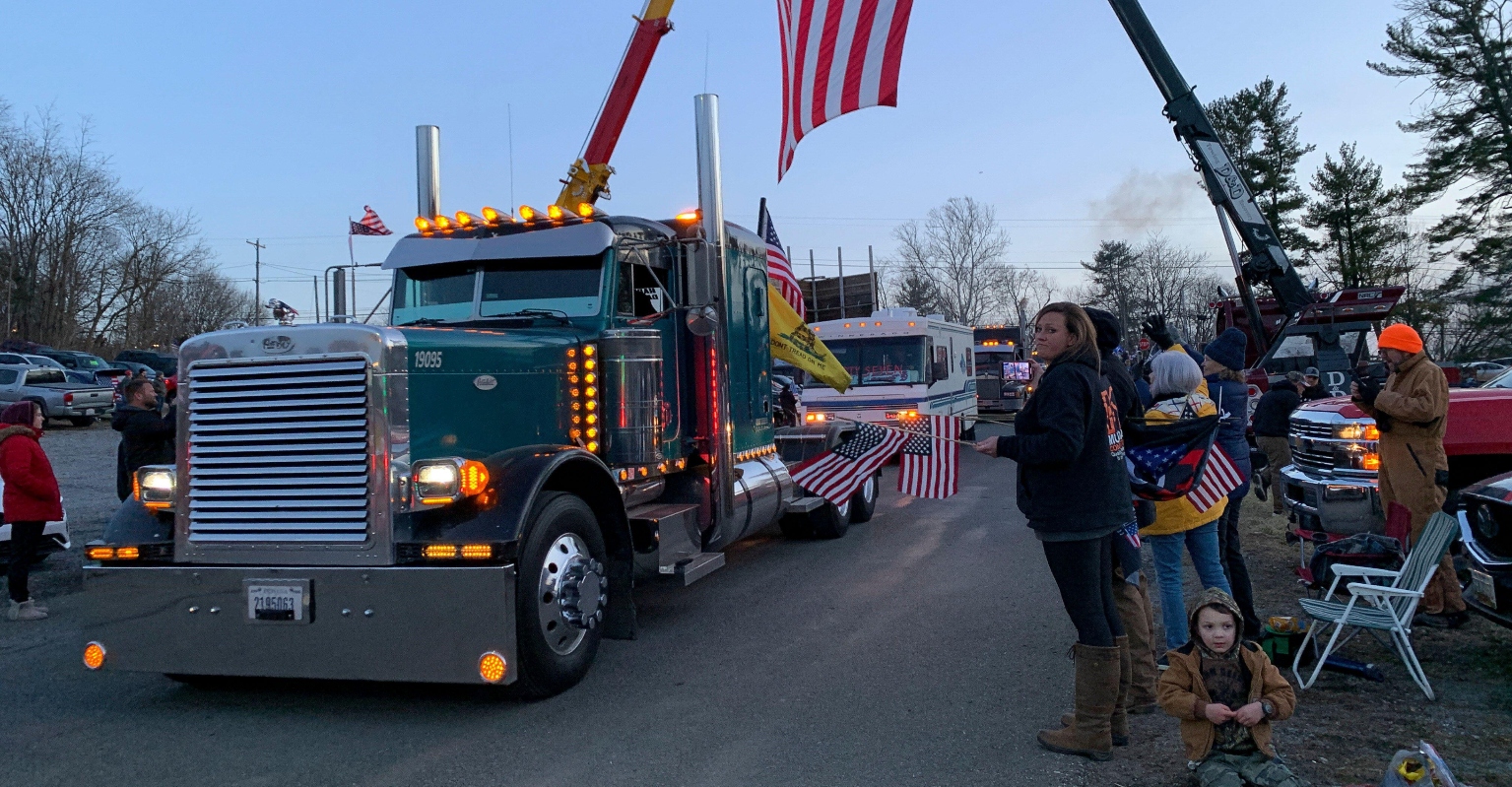 Cyclist singlehandedly holds up 'freedom convoy' trucker protest on streets of DC