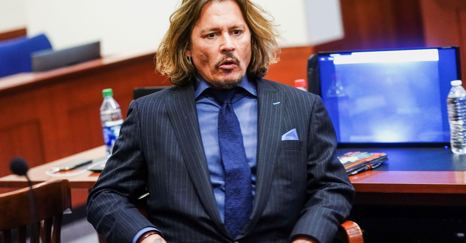 Johnny Depp laughs as Amber Heard's attorney calls 'objection, hearsay' after his own question