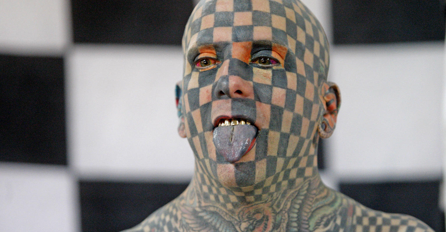 Man covered in 848 square tattoos says he was left sneezing black ink