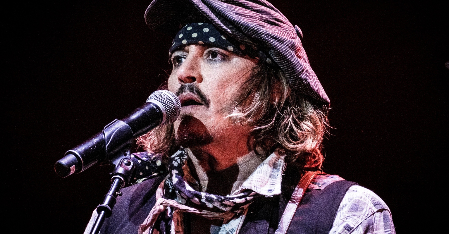Johnny Depp reunites with Camille Vasquez and legal team backstage at his Prague concert