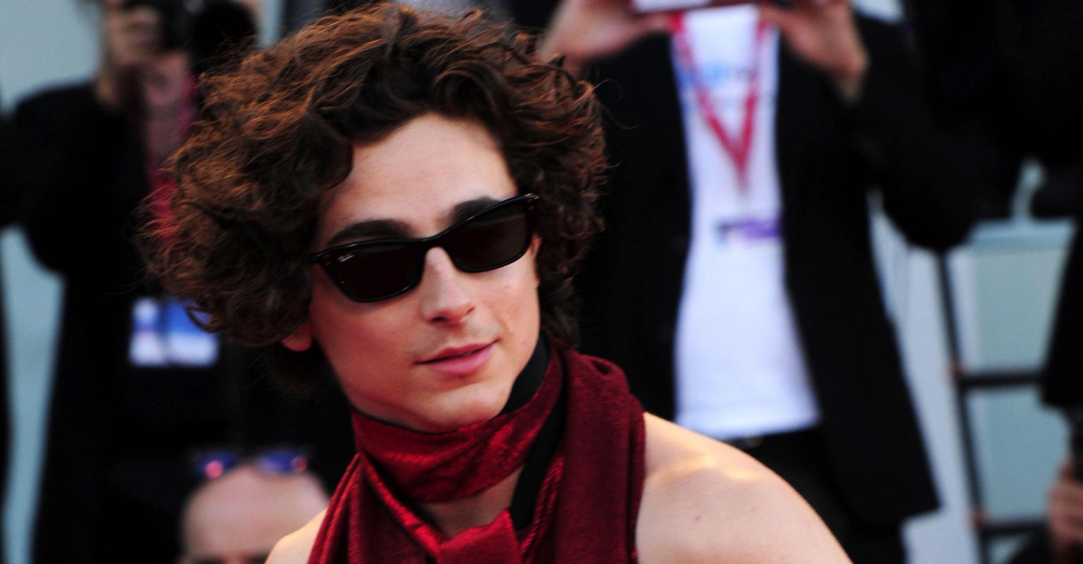 Timothée Chalamet stuns in backless red jumpsuit at premiere of new movie
