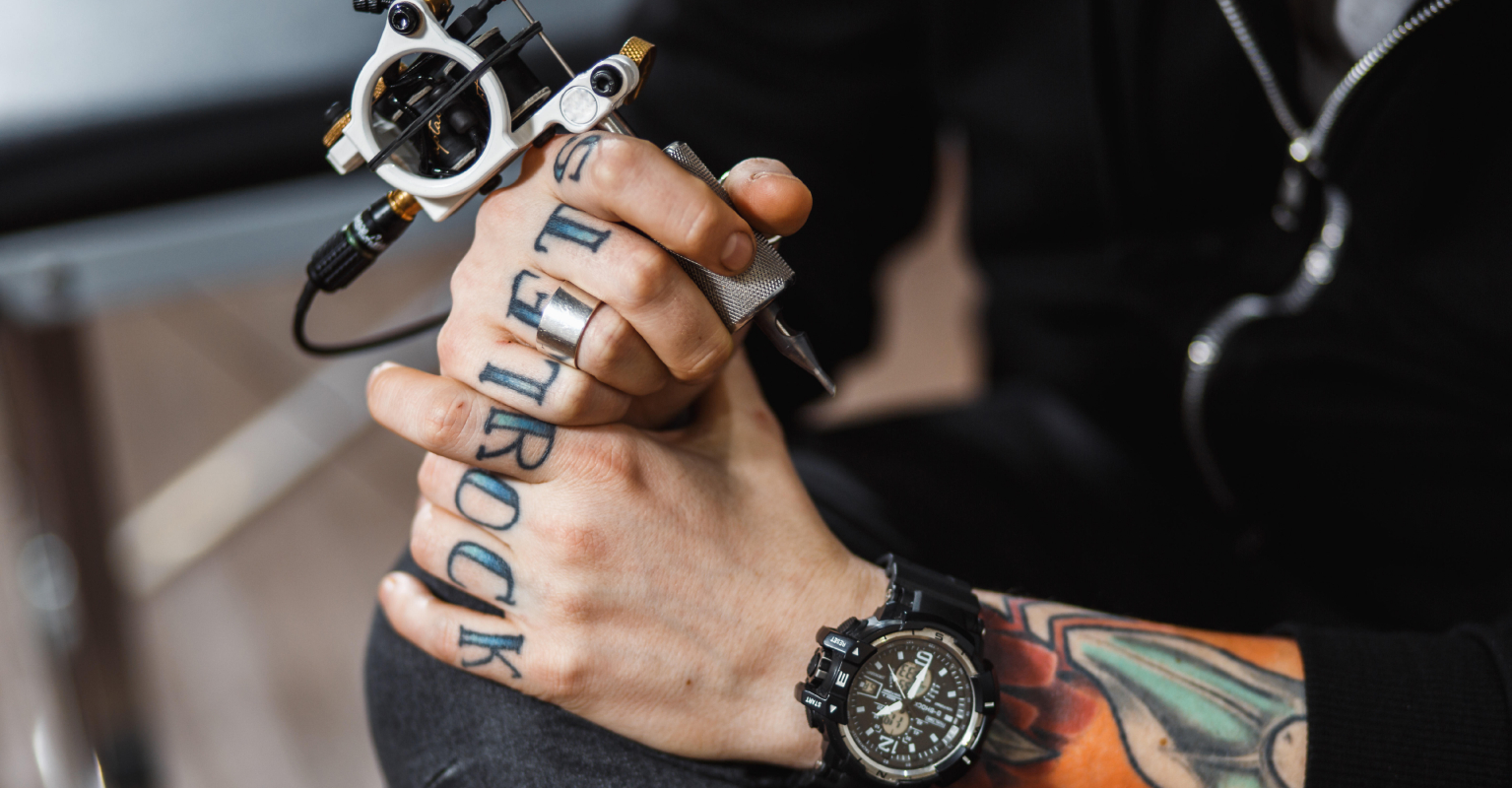 Man gets 'hot dogs' cross tattooed on his head