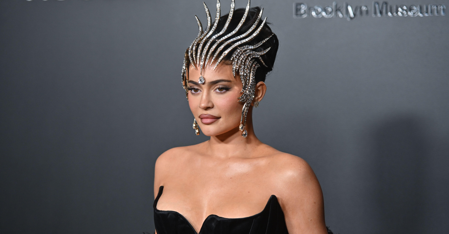 Kylie Jenner looks unhappy as Irina Shayk rocks up in the same 'lion head' dress