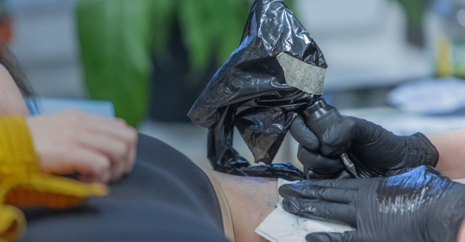 Woman gets blackout neck tattoo and immediately regrets it