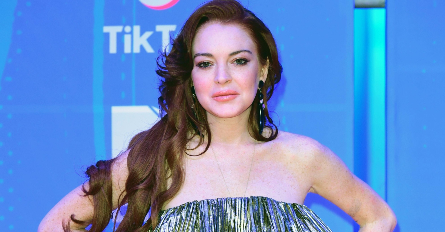 Lindsay Lohan glows as she proudly shows off baby bump in adorable new photos
