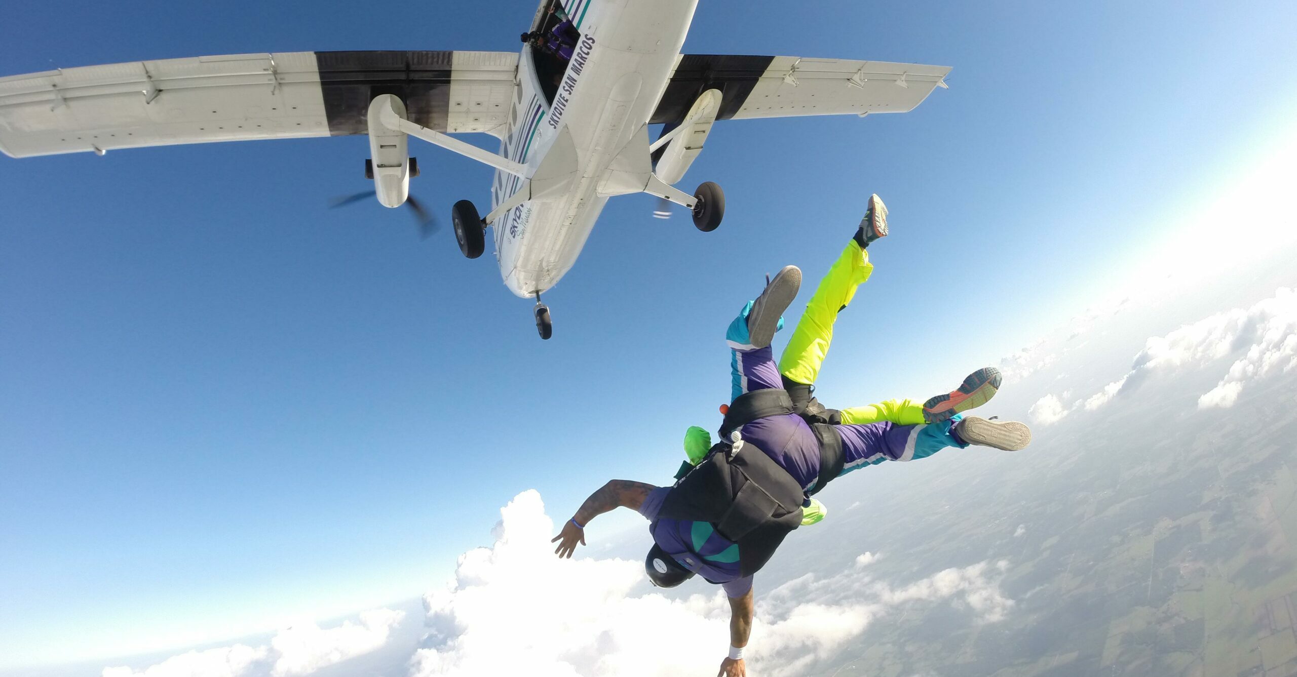 Woman shares hilarious results after paying for photos of skydiving experience