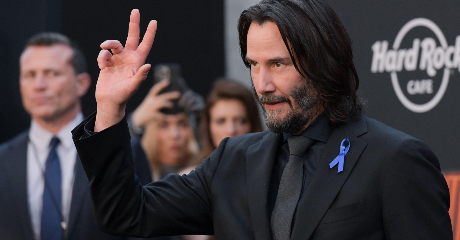 Keanu Reeves and 'John Wick' co-stars honor Lance Reddick with blue ribbons 3 days after death