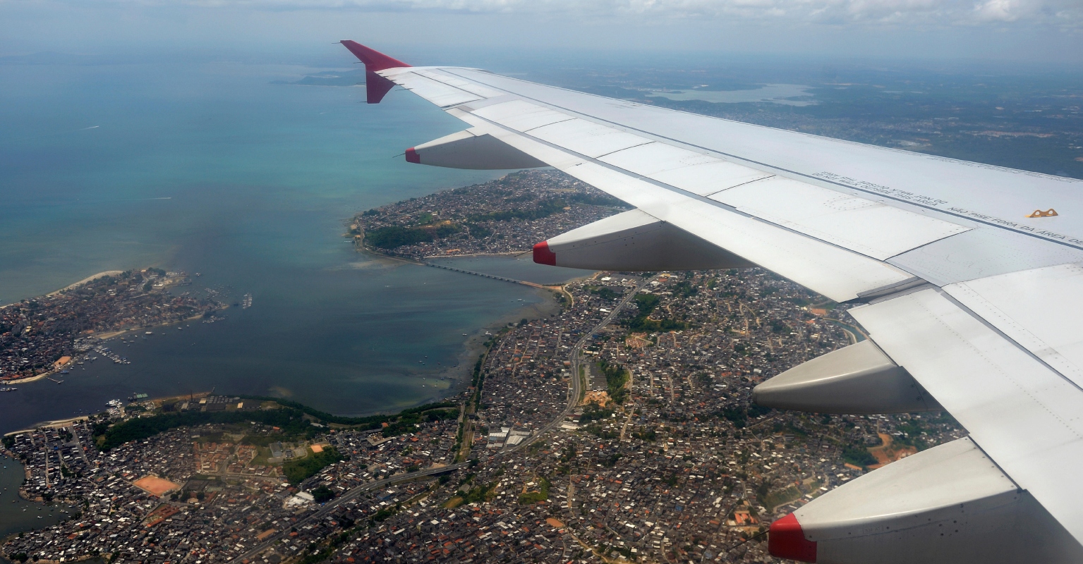 Passenger films employee seemingly putting tape on wing of plane before takeoff