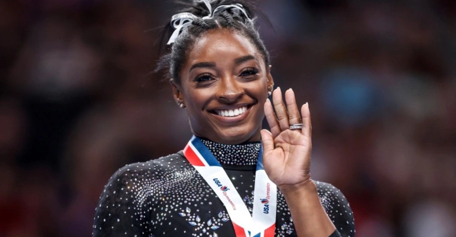 Simone Biles makes history as she wins gymnastics championship for 8th time