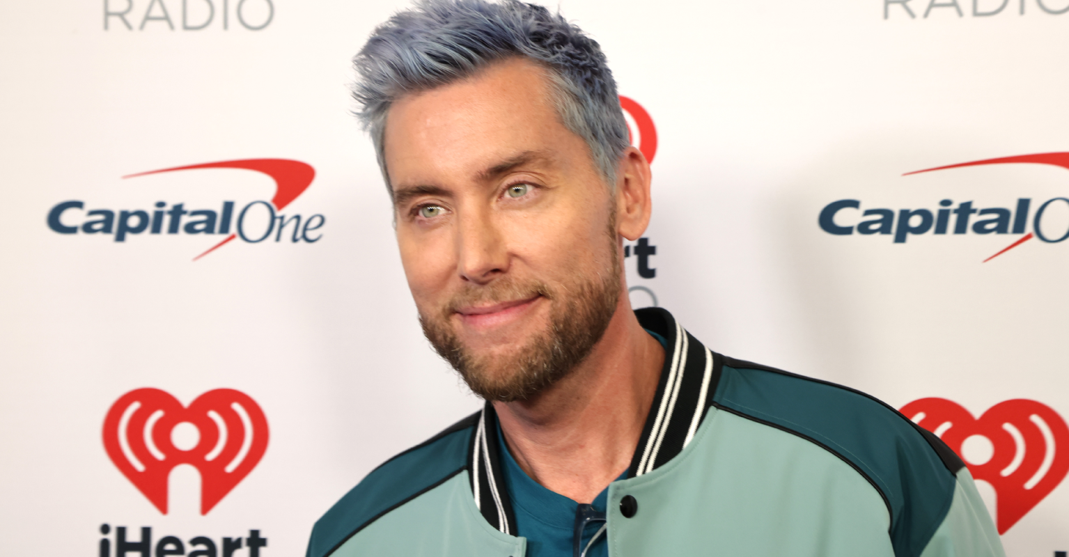NSYNC's Lance Bass trolls the NFL with 'not Taylor Swift' sign during game