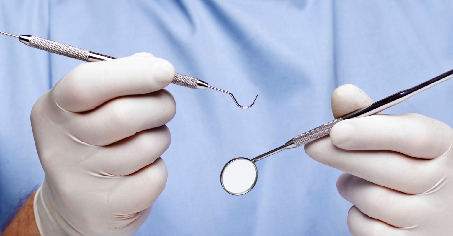 Woman sues dentist who allegedly performed 8 crowns, 4 root canals, 20 fillings in one visit