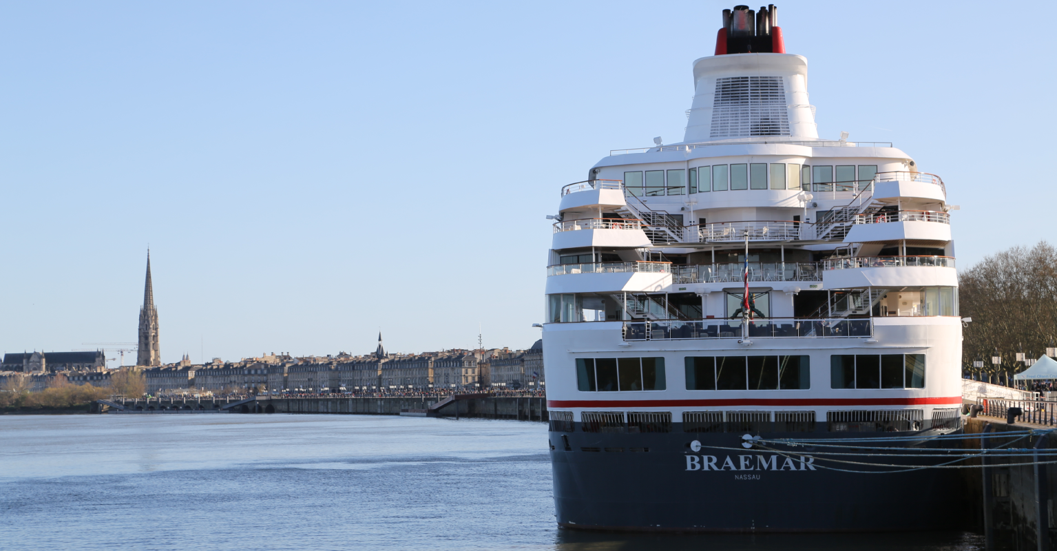 Breathtaking moment huge cruise ship squeezes through canal with just inches to spare